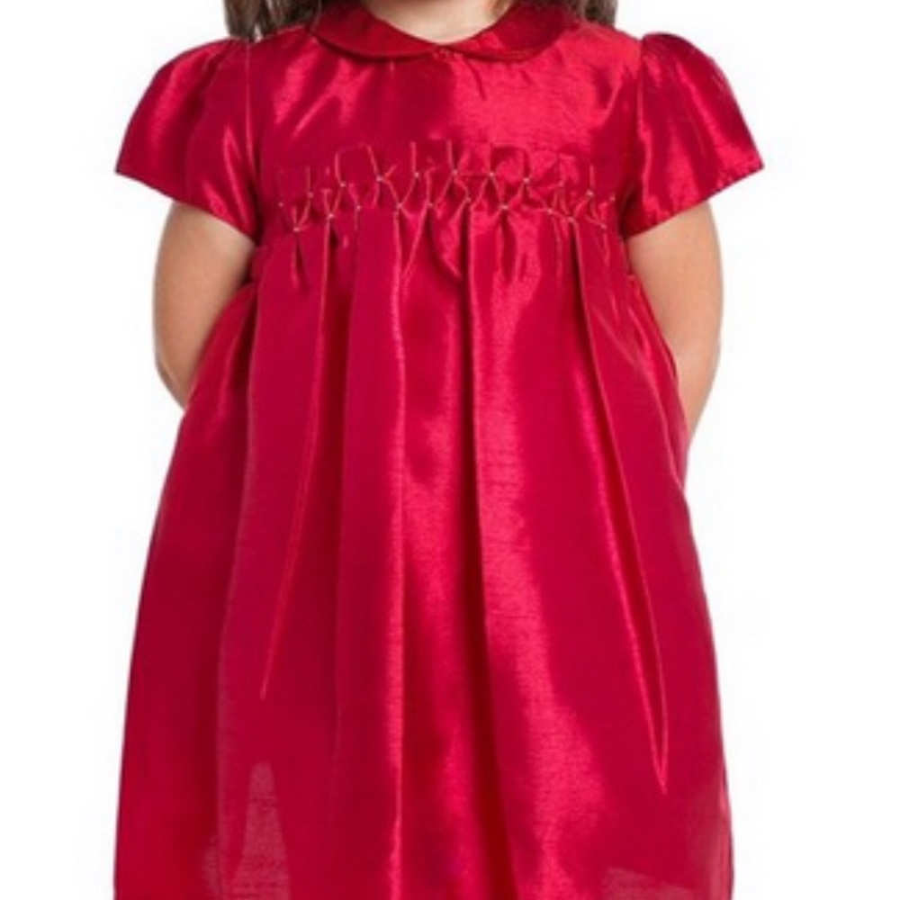 Carriage Boutique’s Raw Silk Hand Smocked Dress